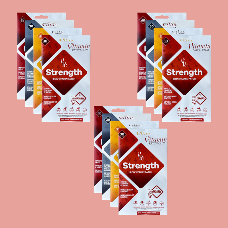Multiple packages of 'Strength' iron vitamin patches on a pink background