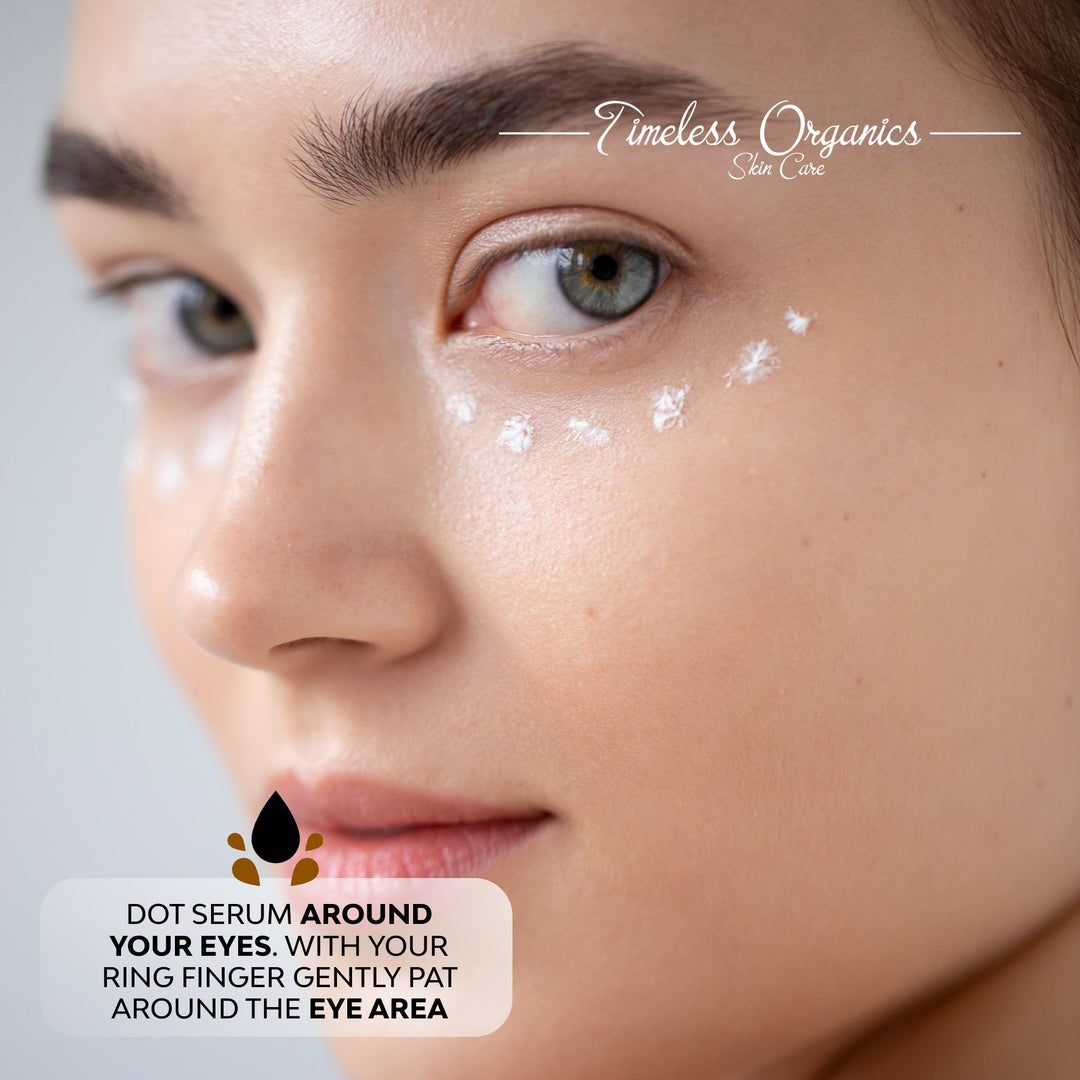 Close-up of a woman's face withTimeless Organics skincare product applied around her eye area.