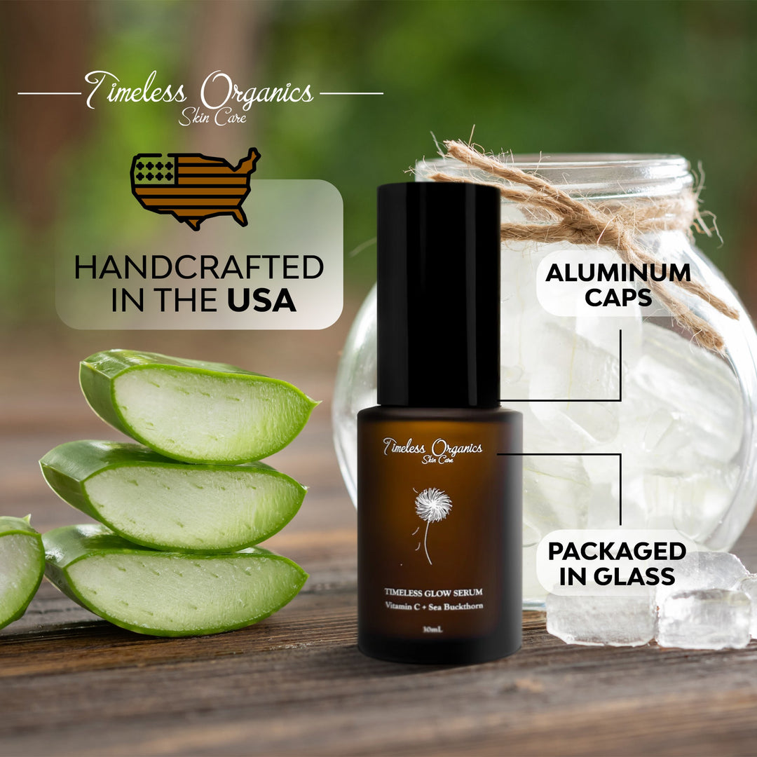 Timeless Organics skincare product with aloe vera slices and a glass jar on a wooden surface.