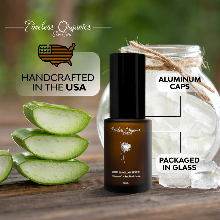 Timeless Organics skincare product with aloe vera slices and a glass jar on a wooden surface.