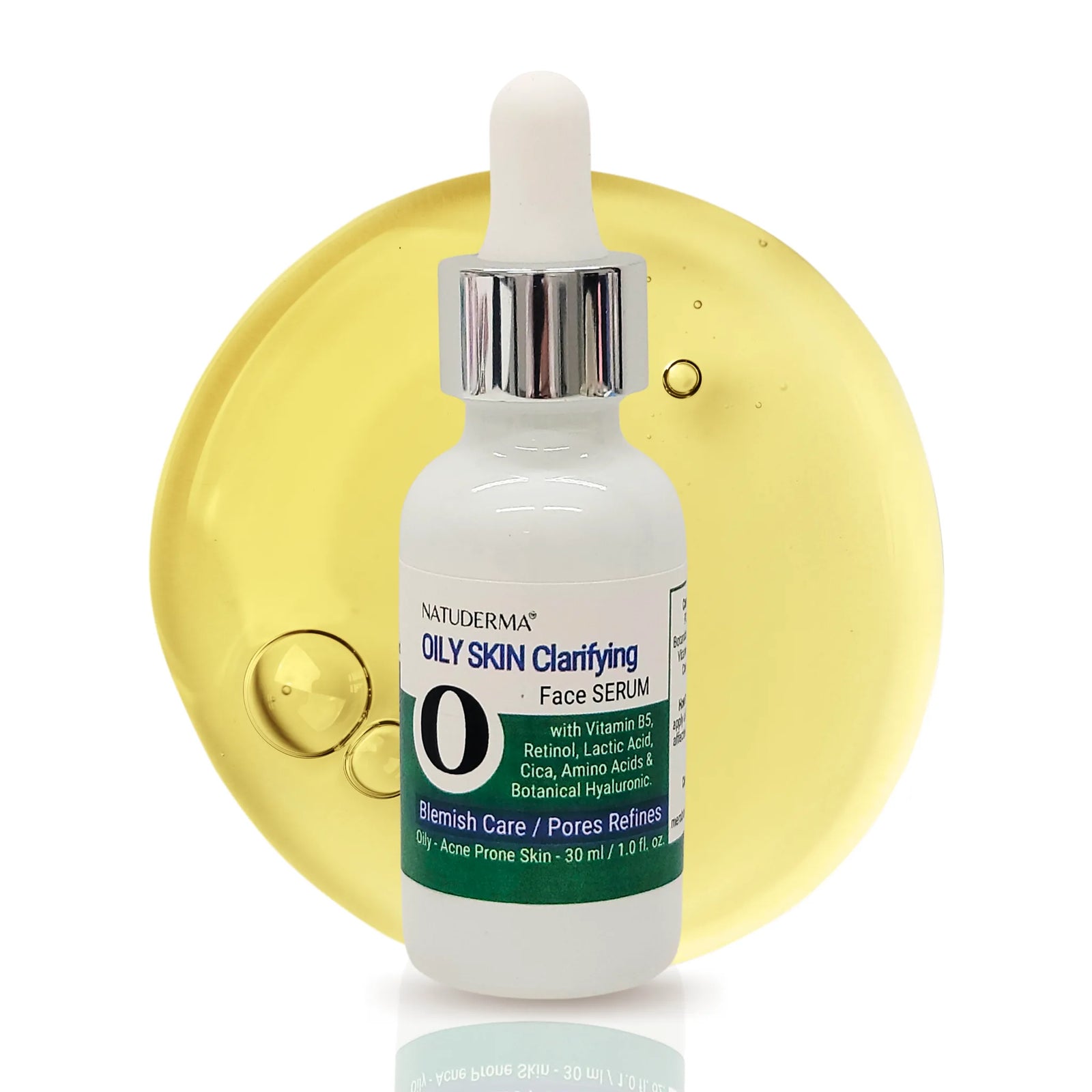 A white 30ml dropper bottle of Natuderma Oily Skin Clarifying Retinol Face Serum centered against a large, translucent yellow drop of the product.