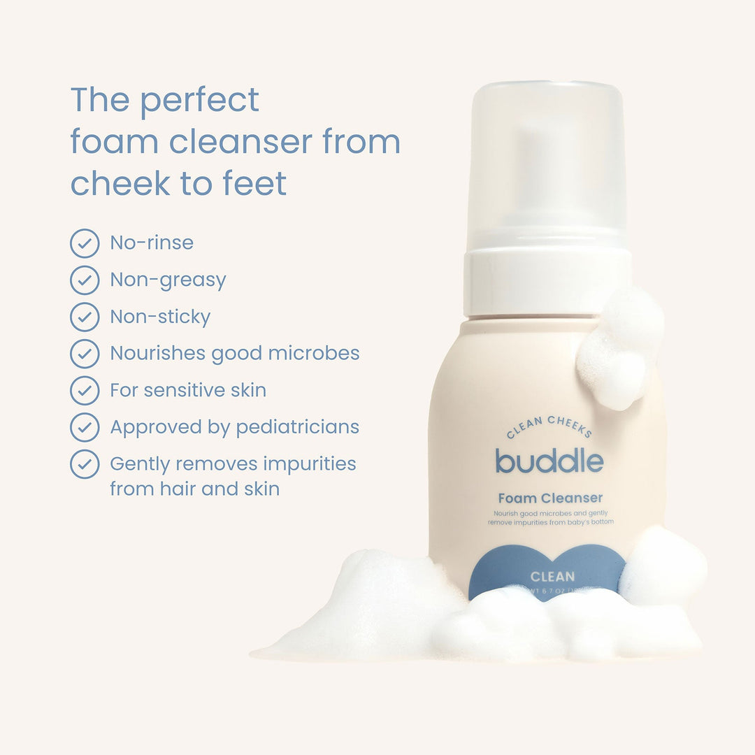 Buddle foam baby cleanser bottle with product features listed on a light gray background