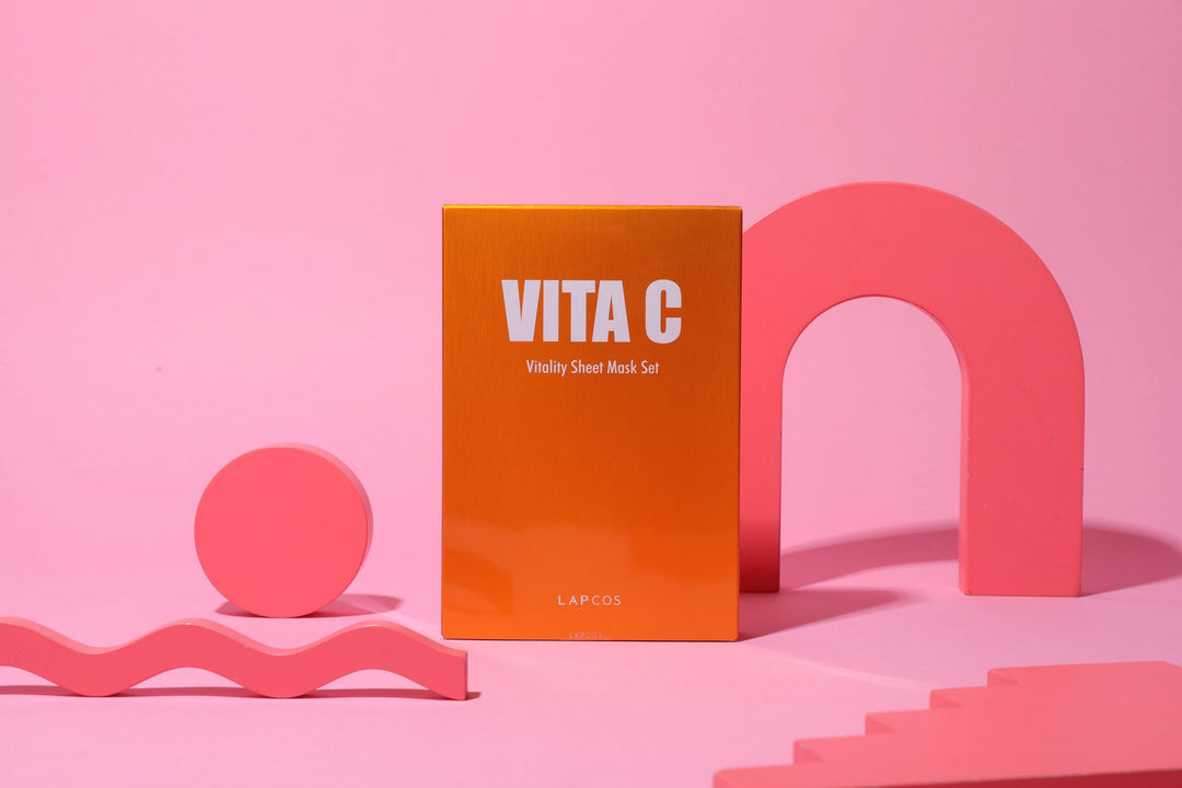 VITA C sheet mask set box on a pink background