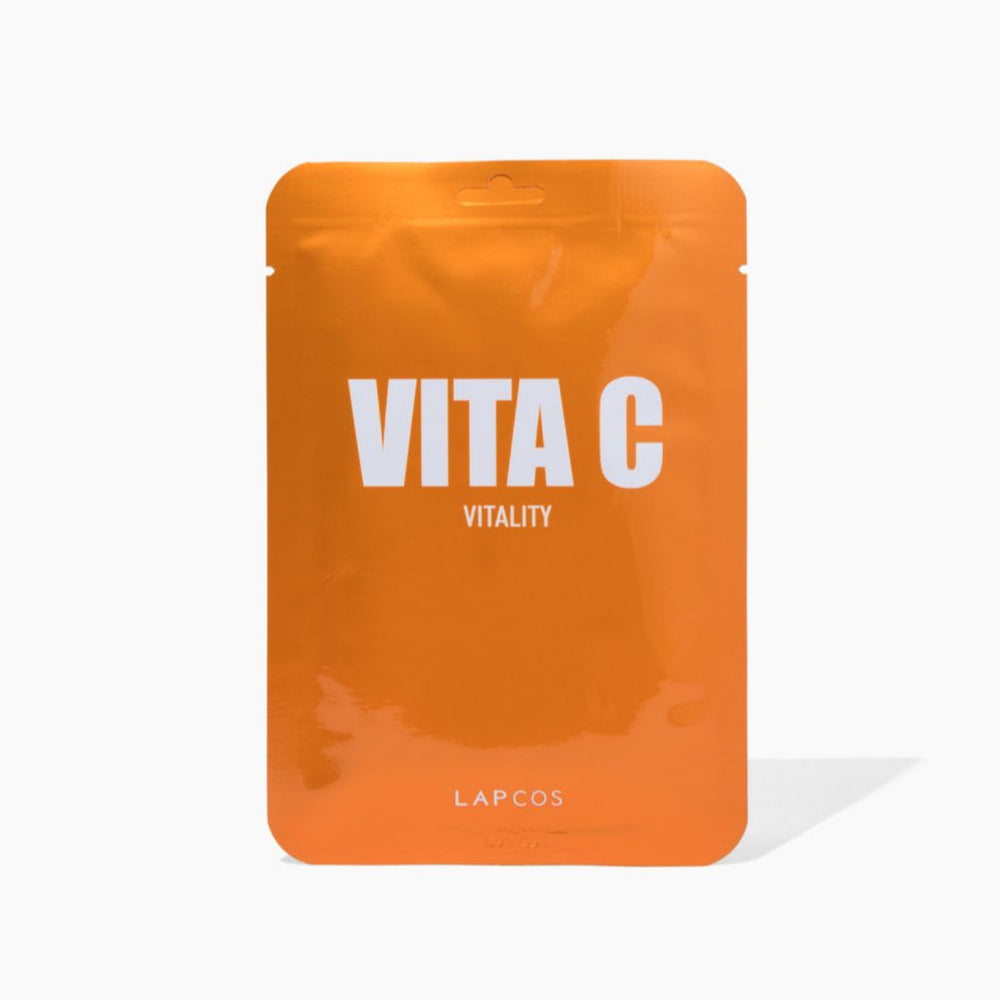 Orange sheet face mask package with 'Vita C' and 'LAPCOS' text on a white background