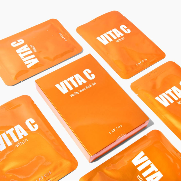 Orange VITA C face mask packaging with 'LAPCOS' branding on a white background