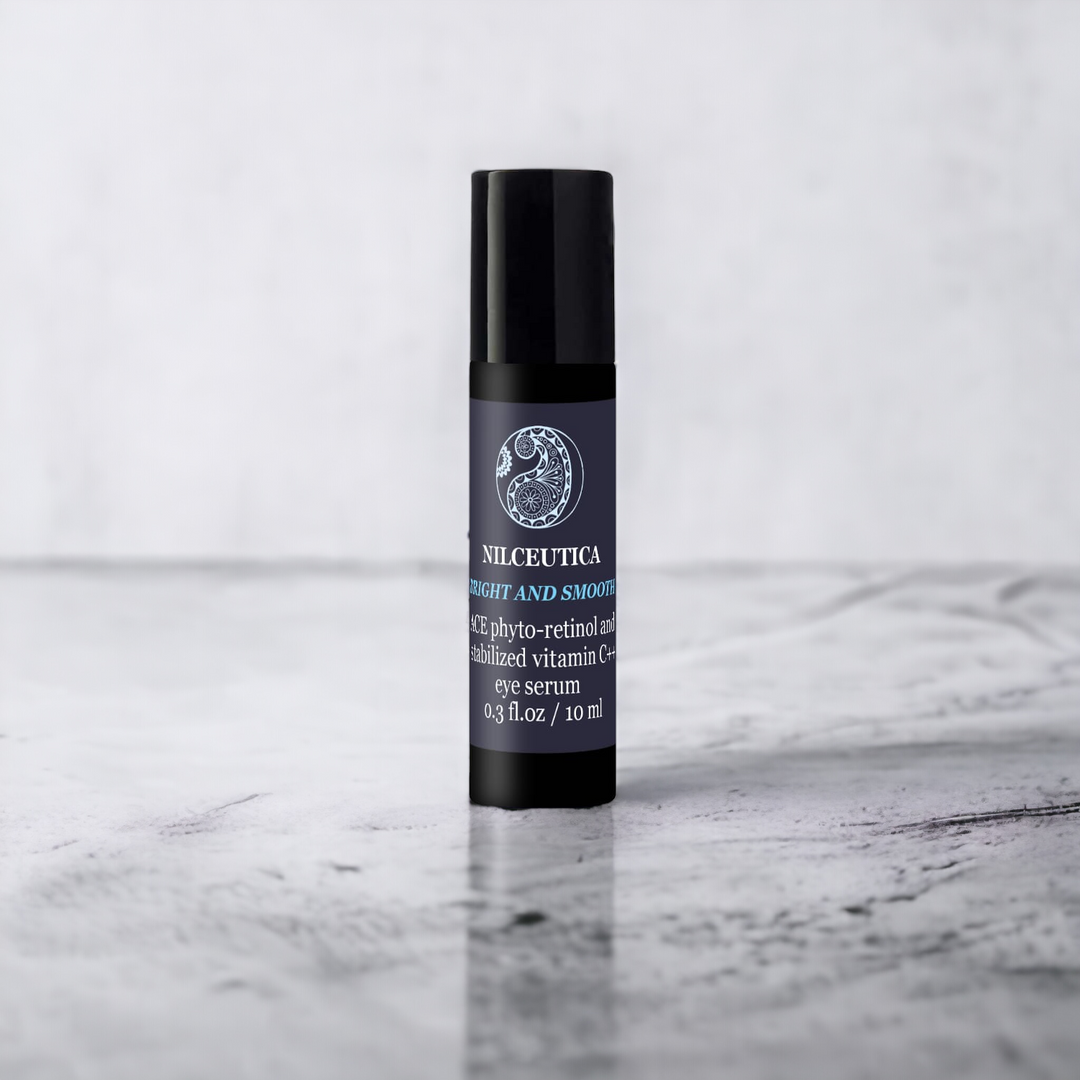 Nilceutica dark circles, puffiness, and wrinkle, black roll-on serum on gray background 
