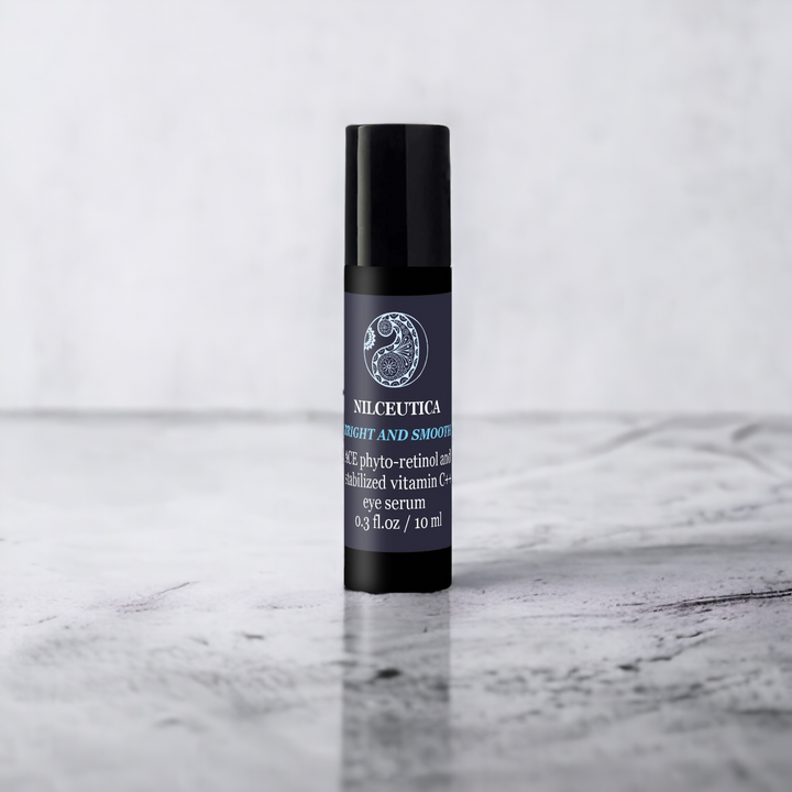 Nilceutica dark circles, puffiness, and wrinkle, black roll-on serum on gray background 
