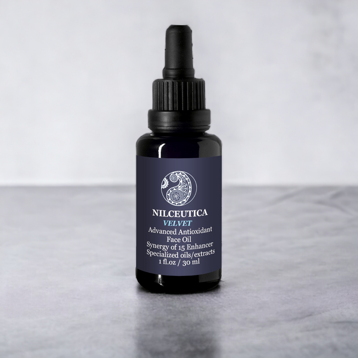 Antioxidant face oul serum , black bottle on gray background 