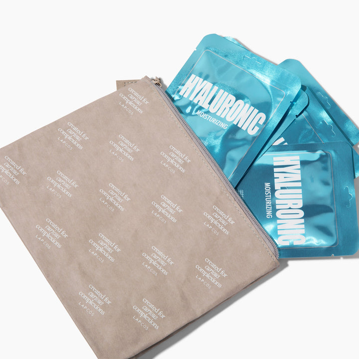 Blue hyaluronic acid face masks on a beige pouch with text.
