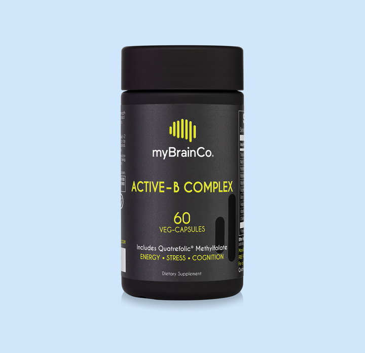 myBrainCo Active B Complex - Biotin capsules, supplement bottle on a light blue background