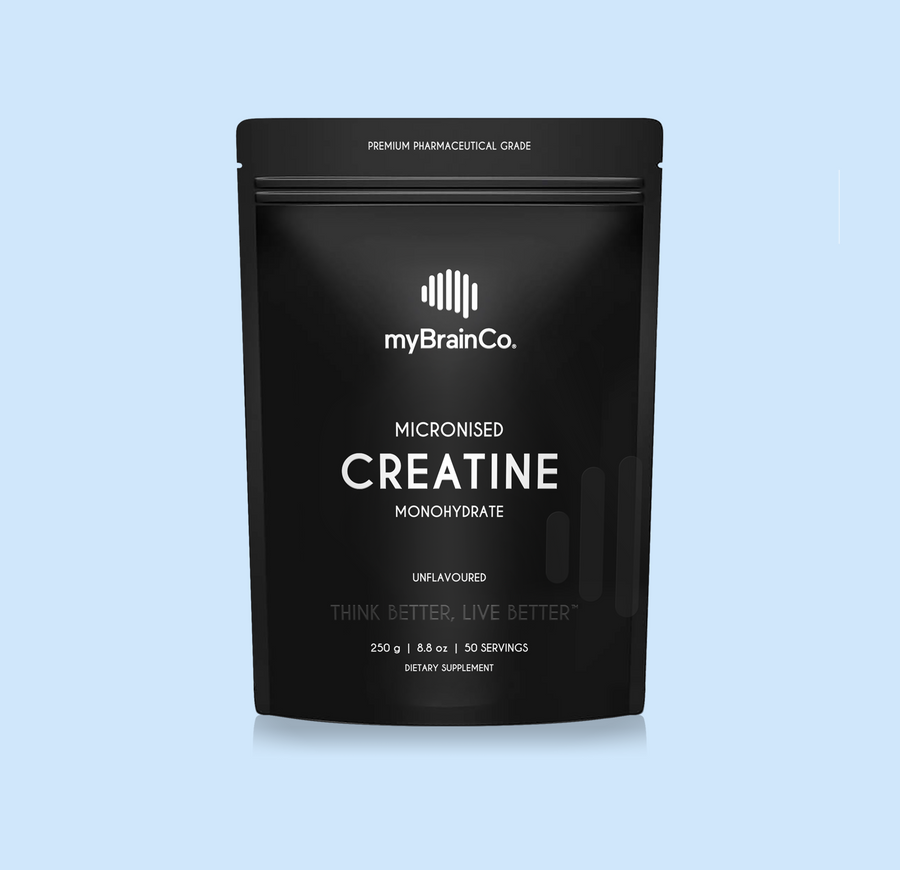Black package of myBrainCo Micronised Creatine Monohydrate on a light blue background