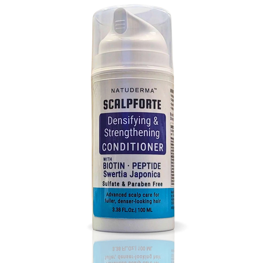 Natuderma Scalpforte hair conditioner bottle, densyfying and strengthening with biotin, on a white background