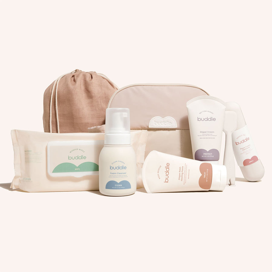 Collection of baby care products with 'buddle' branding on a light background