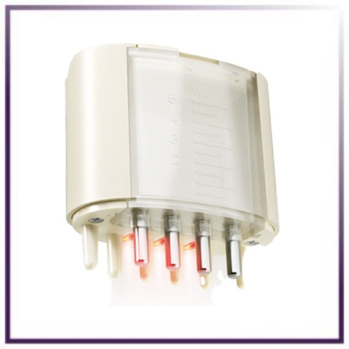 Round electronic component with metallic prongs on a white background
