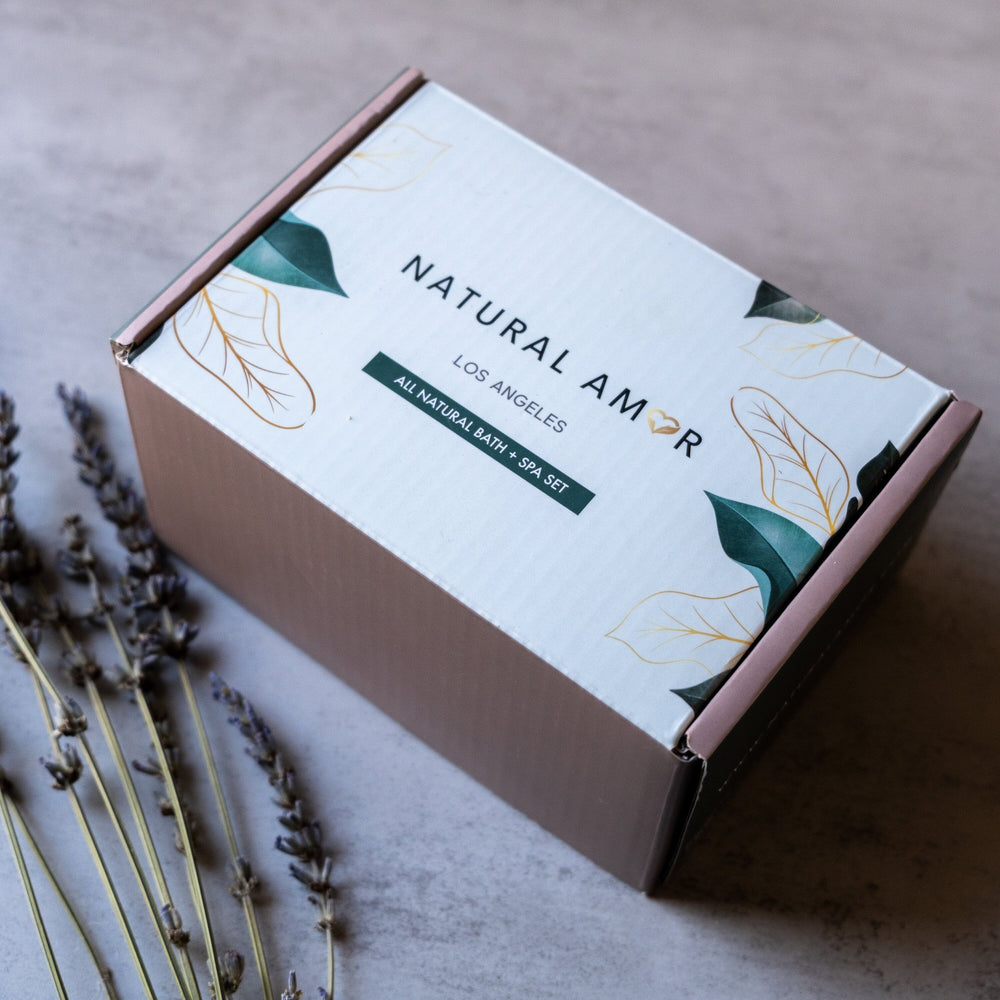 Box labeled 'Natural Amor Los Angeles' with lavender flowers on a neutral background