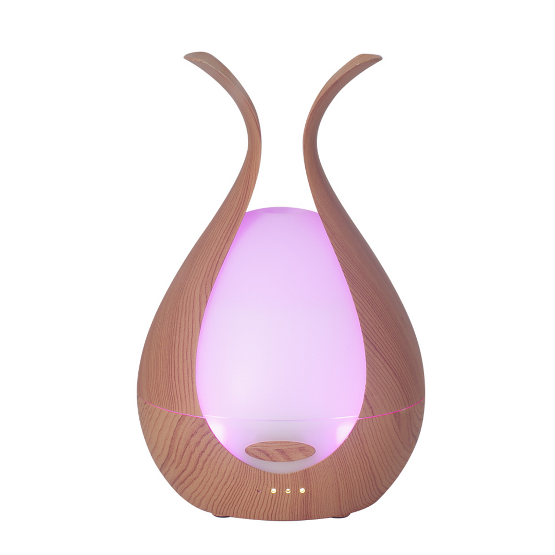 Wooden diffuser with a glowing purple light on a white background