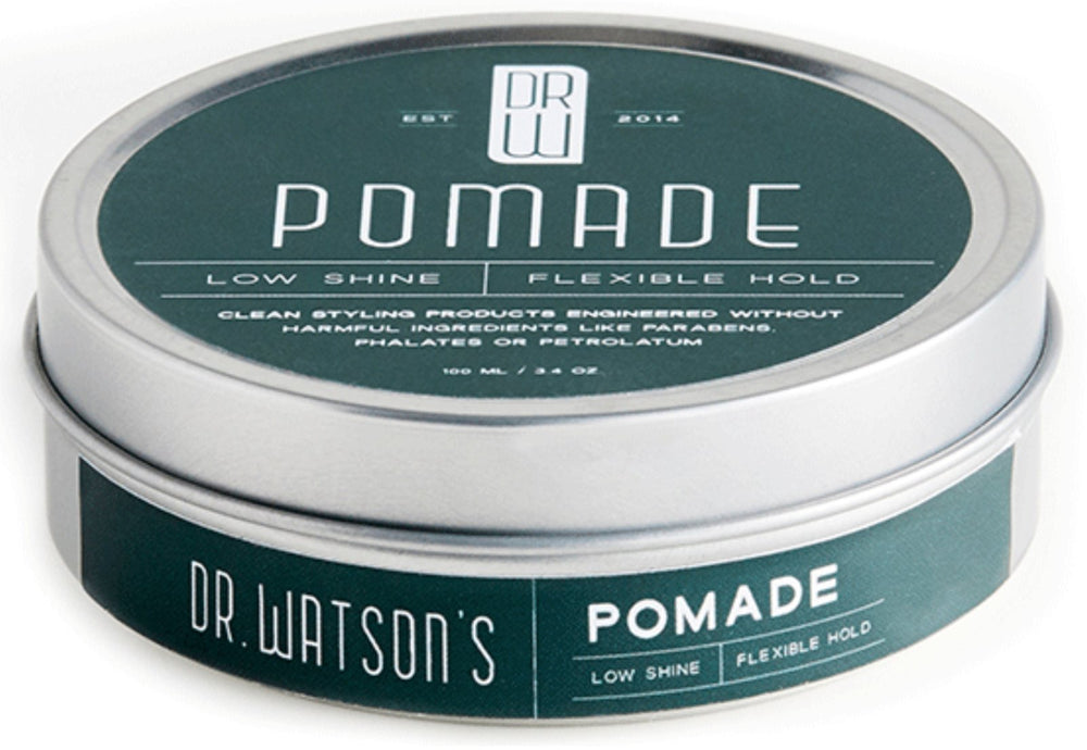 Dr. Watson's pomade container with green and silver design on a white background