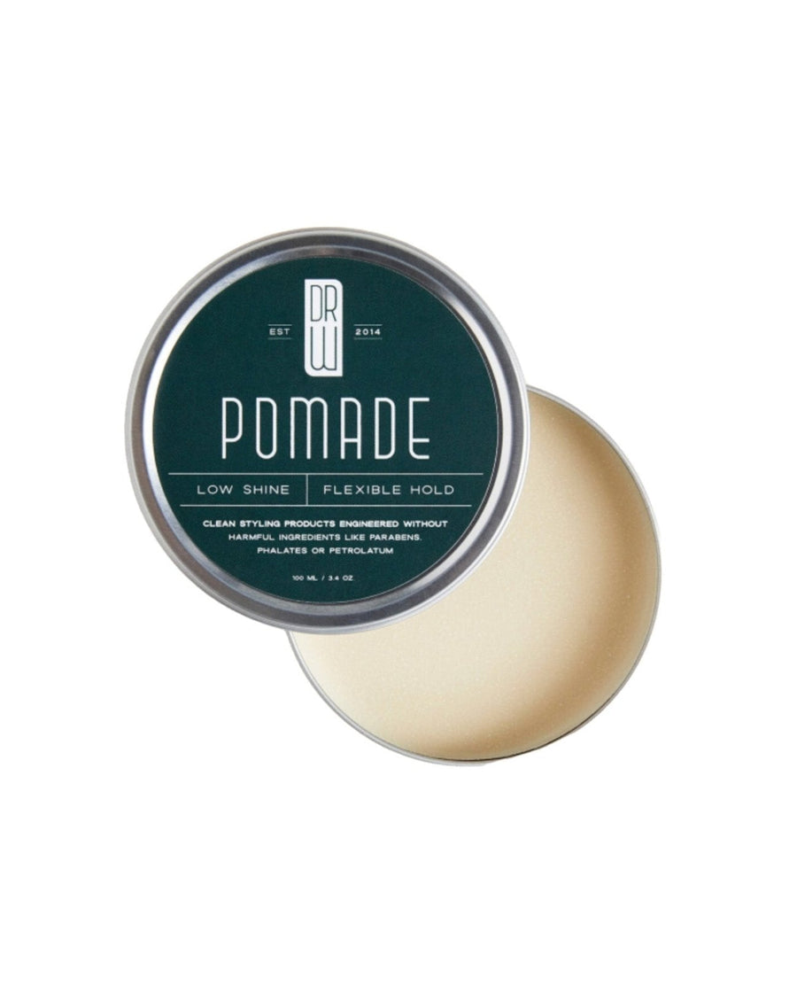 Hair Pomade container with lid open on a white background